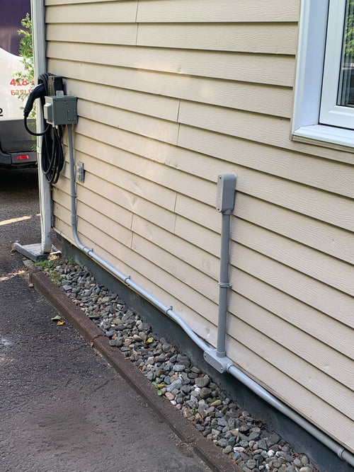 Installation de 2 borne de recharge, une dans le garage et une à l'extérieur borne Evduty 40A